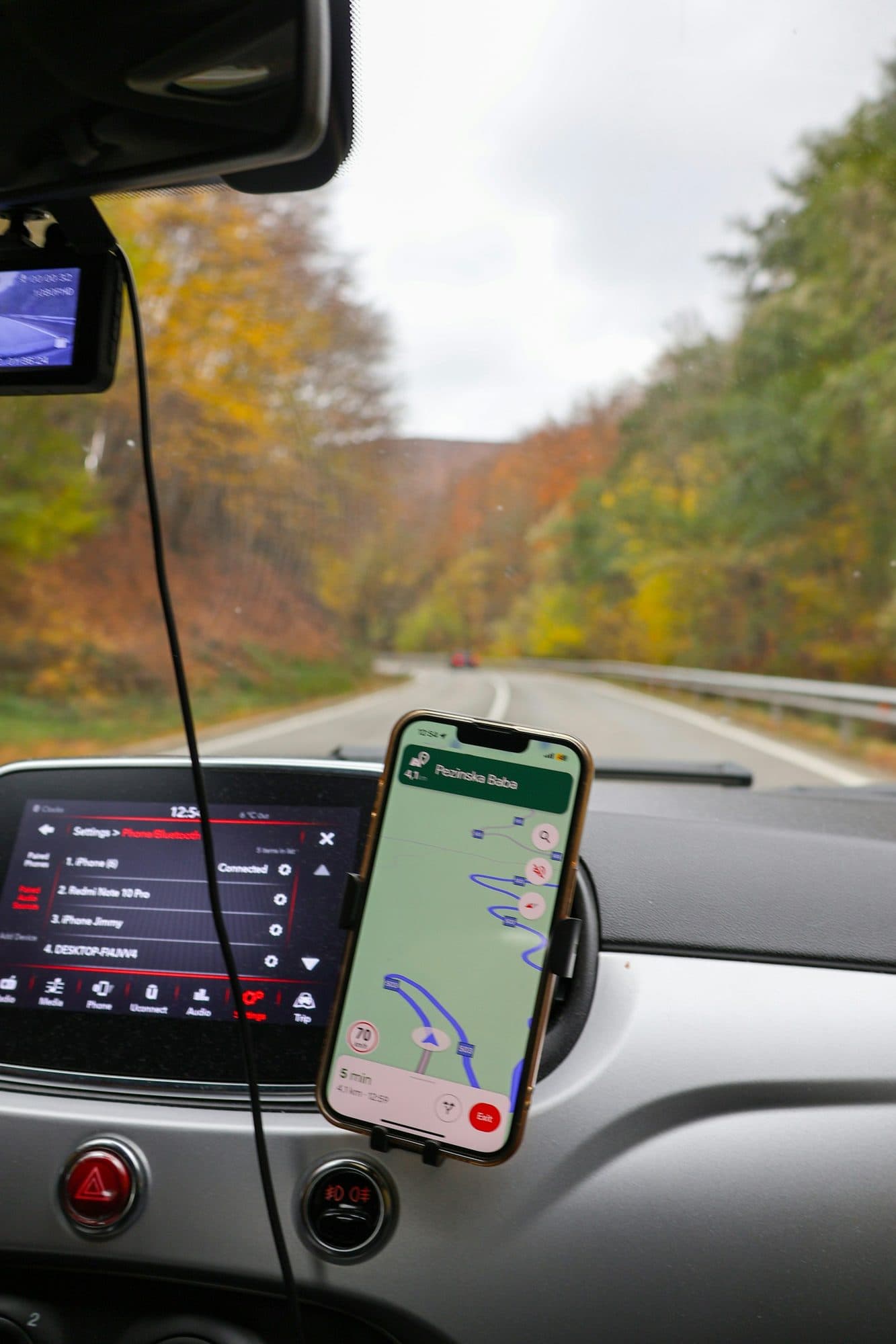 Driving along an autumn road